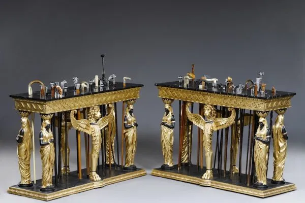 A hand sculptured pair of Egyptian Revival highly decorative stick stands – representing the many choices and different pathways to take when come to the many crossroads we have in life.